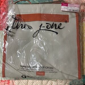 Cargo bungee cord carrier by Thirty-One.